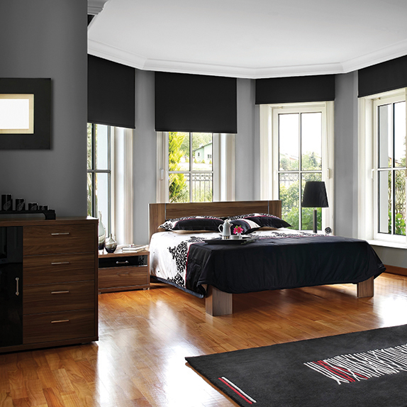 Black Out Fabric Rollers In Modern Bedroom.